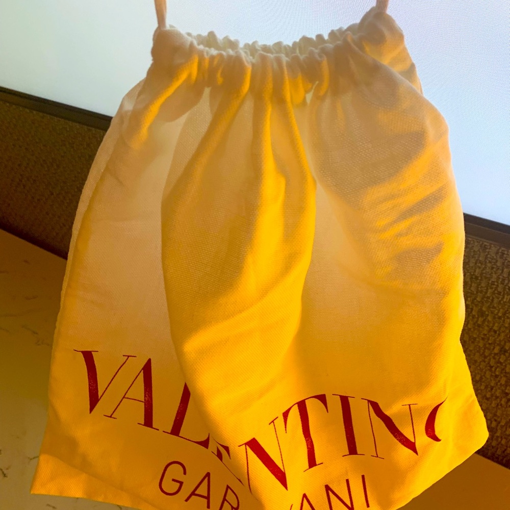 Brand new dust cover bag with string with logo  from my new Valentino purse.